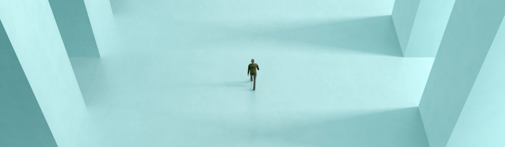 Person standing in an expansive geometric space, symbolising user confusion and uncertainty